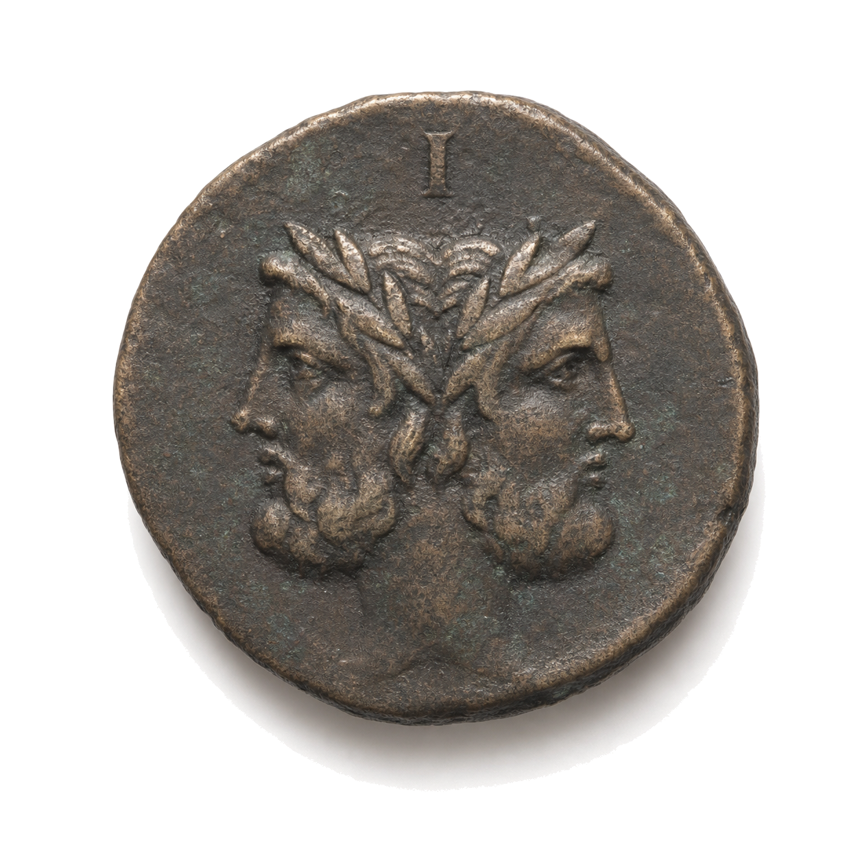 Slightly angled struck bronze Roman as with a worn Janus relief